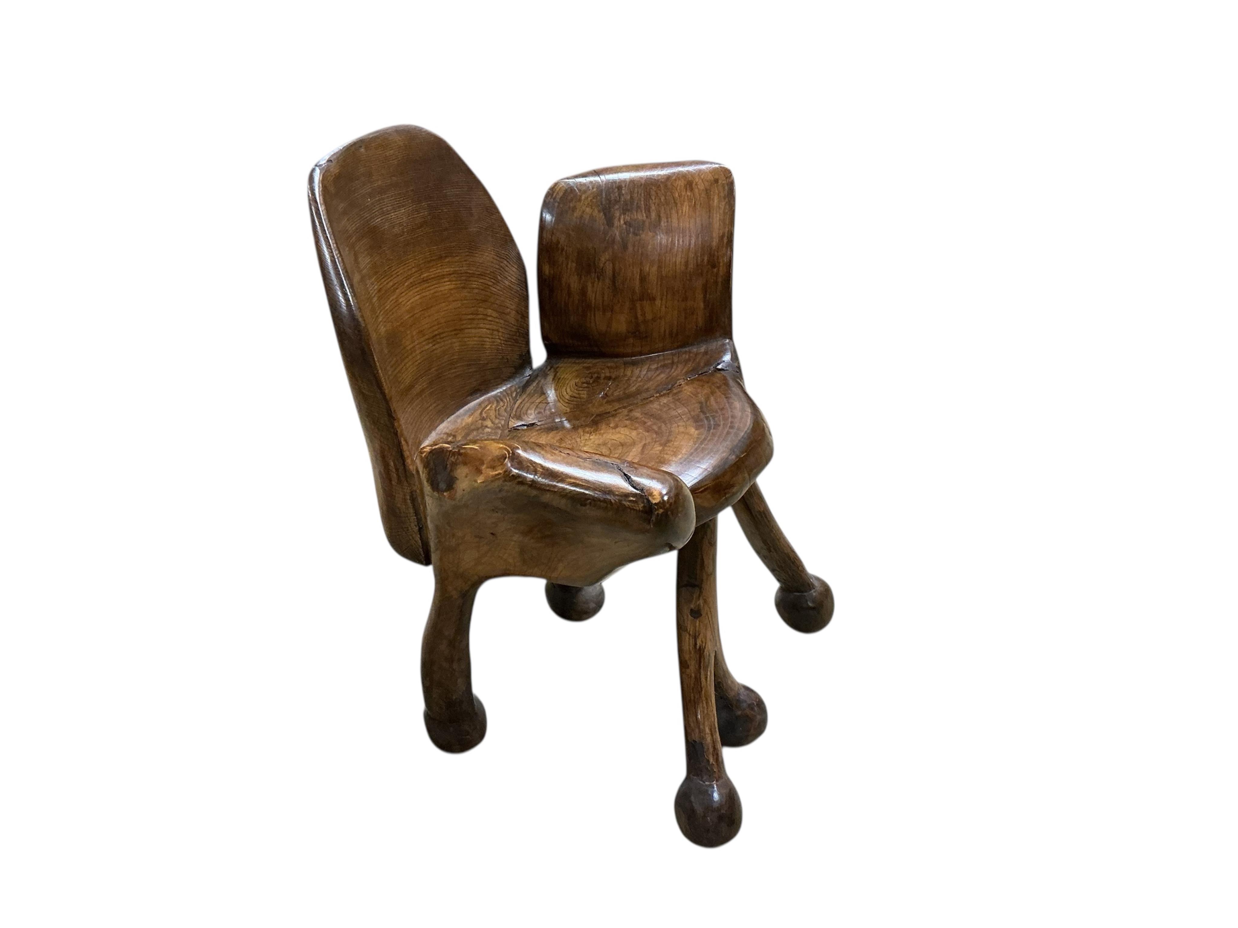 Pierre Decorse (b.1953), a naturalistically modelled elbow chair raised on irregular legs, width 68cm, depth 41cm, height 75cm